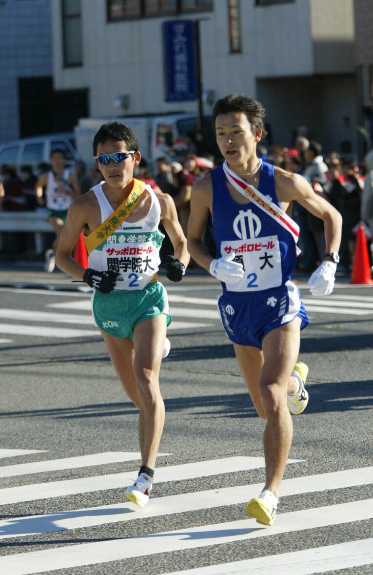 “花の2区”で12人抜きの好走を見せた尾田さん（4年時の2003年箱根駅伝にて）　©AFLO
