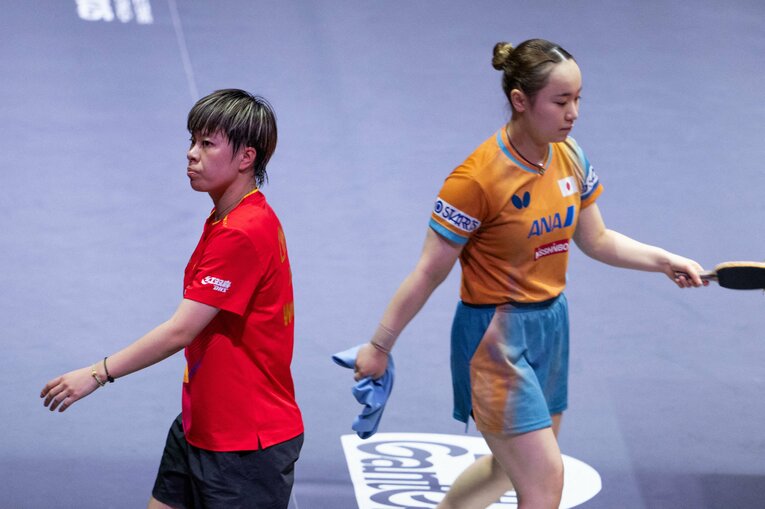 ドーハ大会の準々決勝で難敵・王芸迪（左）を下した　©JIJI PRESS