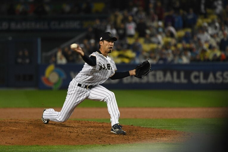 前回WBCで好リリーフを連発した秋吉　©BUNGEISHUNJU