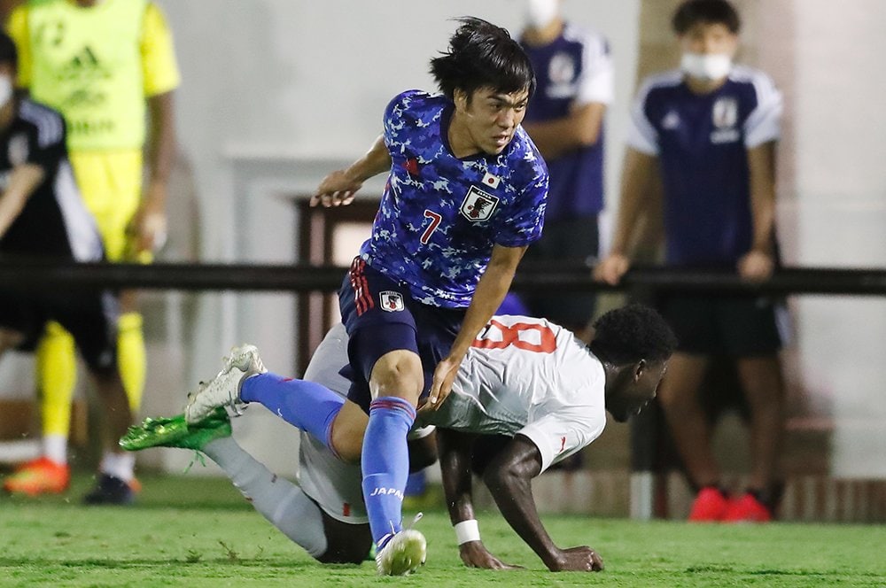 スイス戦での田中聡　©Mutsu Kawamori