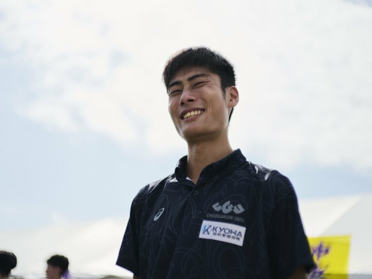 チームも予選会を「まさかの」首位通過で笑顔の近田主将　©Yuki Suenaga