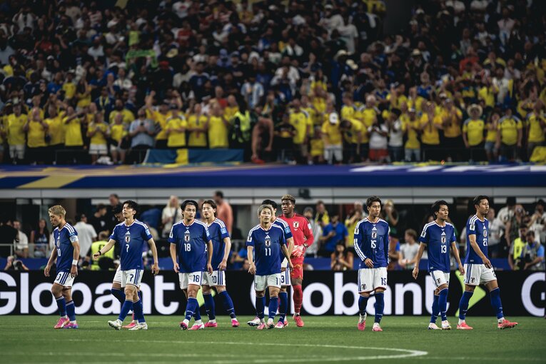 失点後にピッチ上で話し合った選手たち　©Kiichi Matsumoto／JMPA