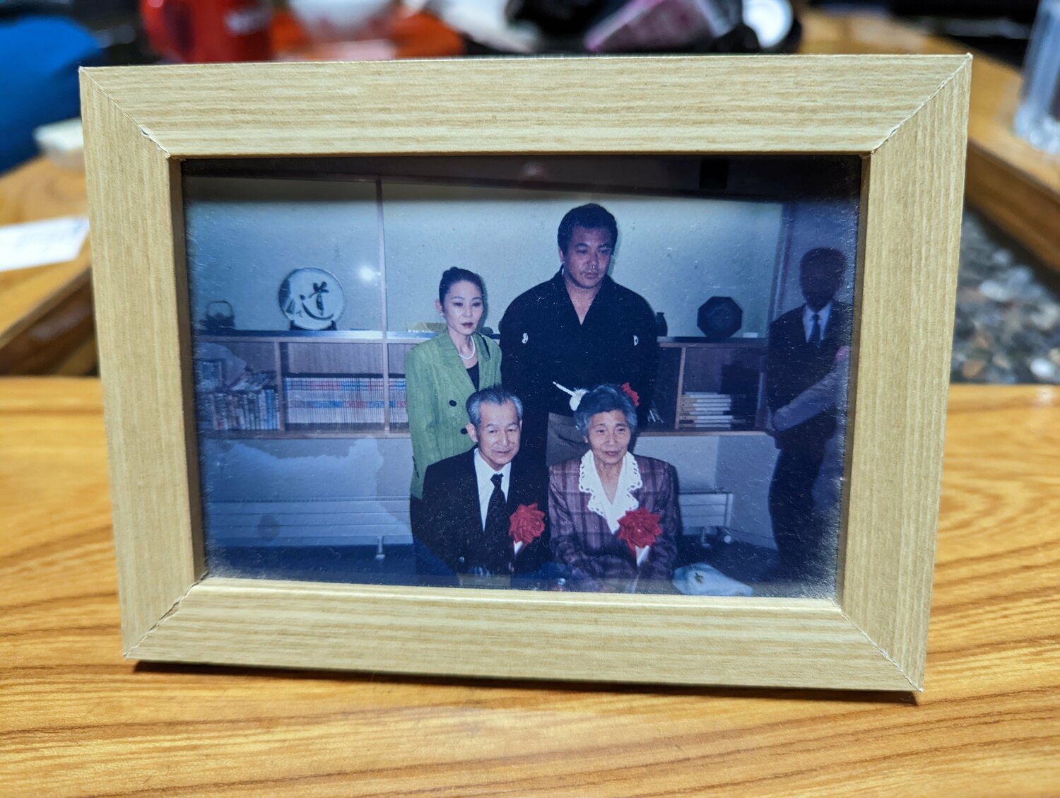 左上から姉、九重親方、両親の集合写真