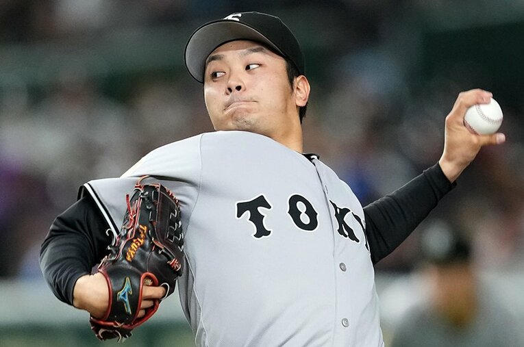 オープン戦で実力の一端を見せた巨人の石川達也。じつは「左投右打」だ ／ photograph by Masterpress/Getty Images