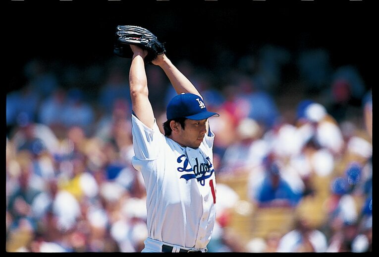 野茂英雄／1968年8月31日生、大阪府出身。'90年にドラフト1位で近鉄に入団し、最多勝はじめ8冠に輝く。'95年、ドジャースに加入し、新人王と最多奪三振を獲得。'96年と'01年にはノーヒットノーランを達成した。メジャー通算123勝。'16年よりパドレスのアドバイザーを務める ©️Kazuaki Nishiyama