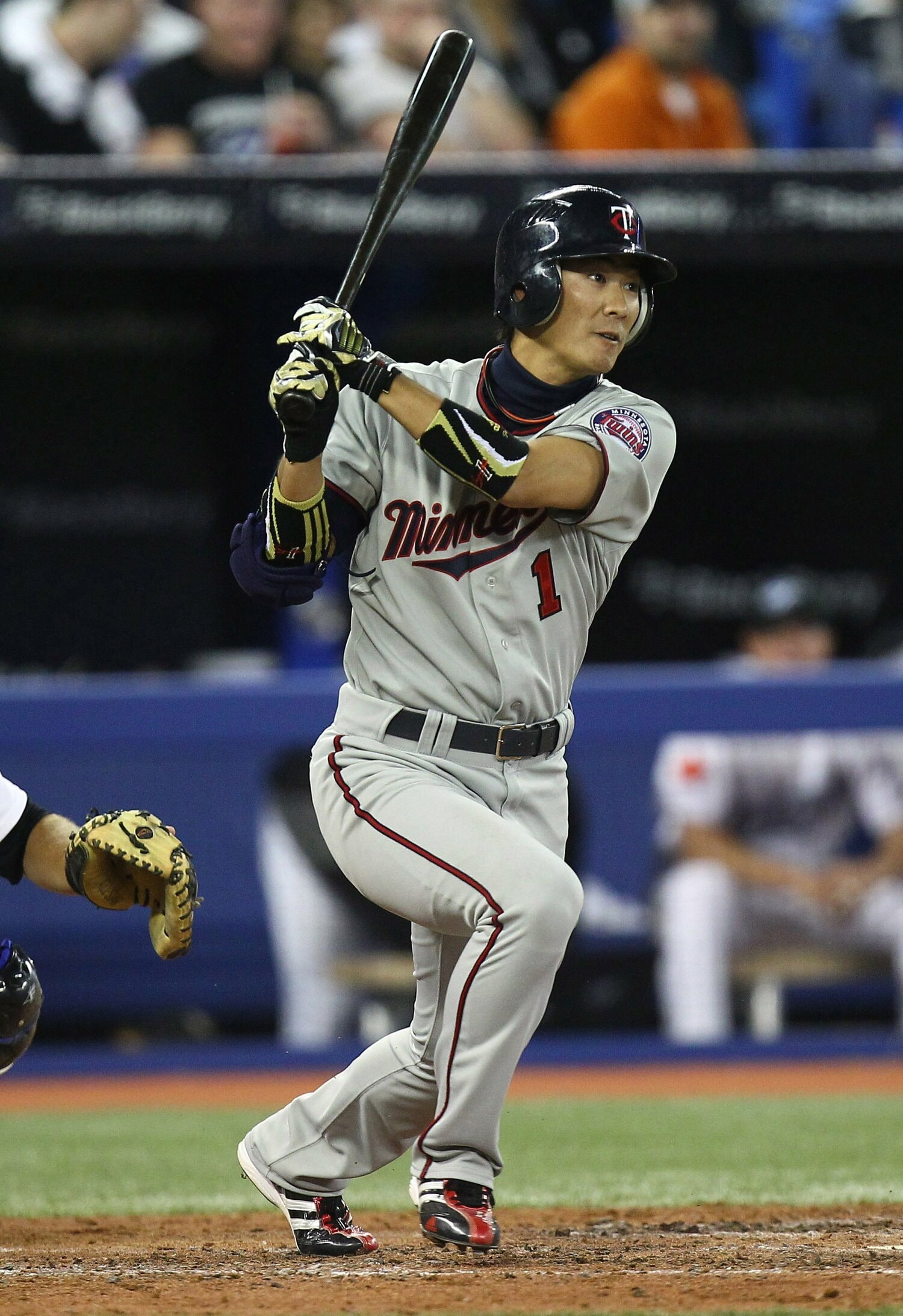 2011年からMLBミネソタ・ツインズでプレー。26歳でのデビューは当時、日本人野手最年少の記録だった　©︎Tom Szczerbowski/Getty Images