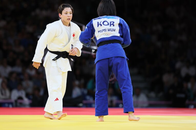 出口とホ・ミミの激闘　©Kaoru Watanabe/JMPA