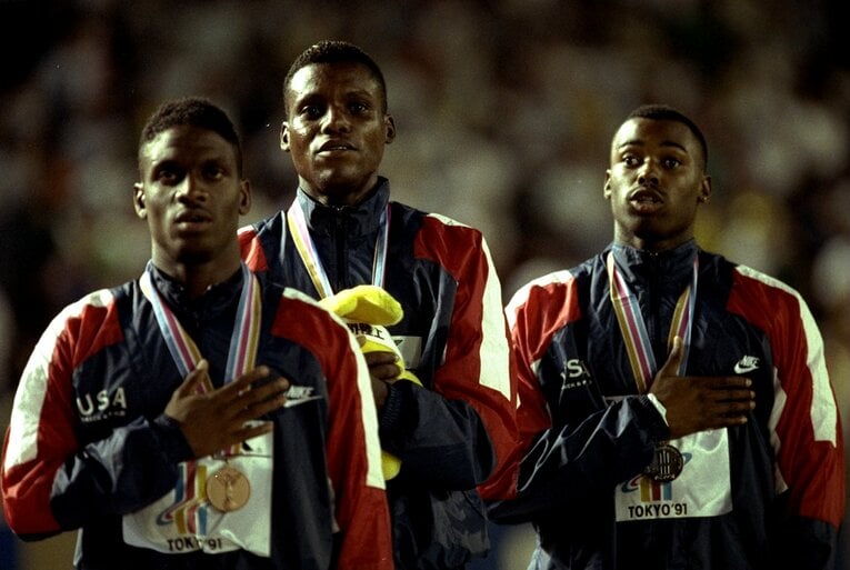 100mは米国が表彰台を独占。（左から）ミッチェル、ルイス、バレル ©︎Getty Images