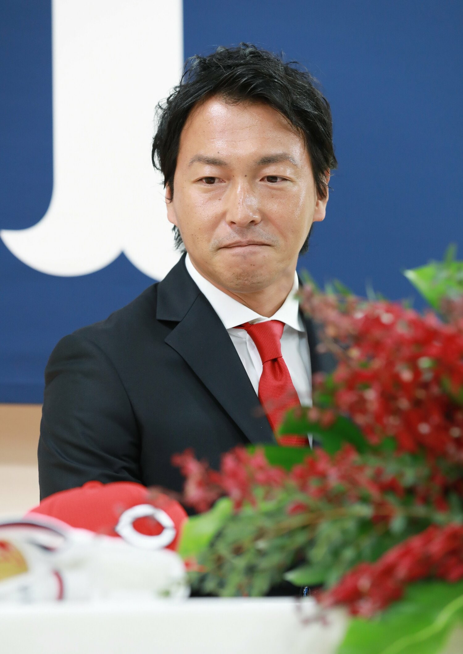 2019年1月、広島の入団会見で。丸佳浩の人的補償での移籍だった　©JIJI PRESS