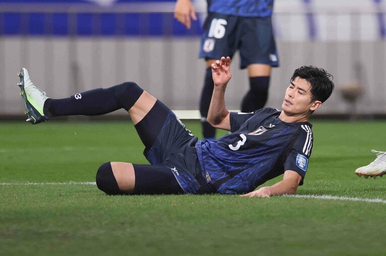 オウンゴールの瞬間、顔をしかめる谷口彰悟　©JIJI PRESS