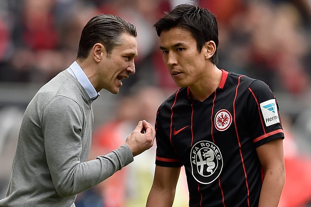 2016年4月の長谷部とコバチ監督　©Getty Images