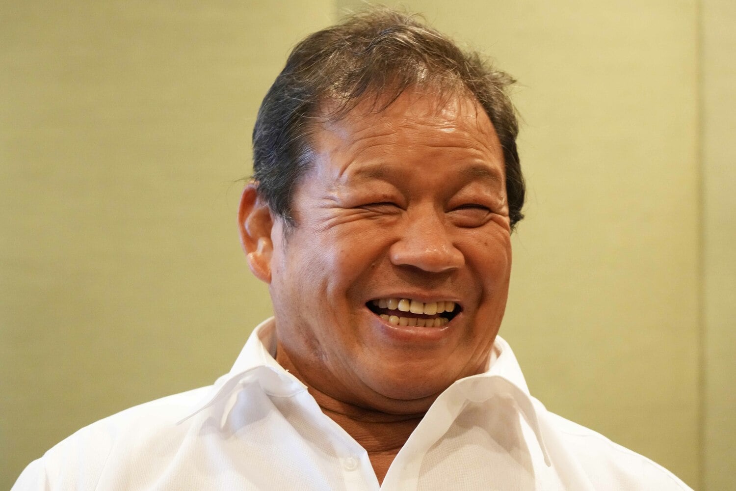 笑顔で『マッチョ・ドラゴン』について語る藤波