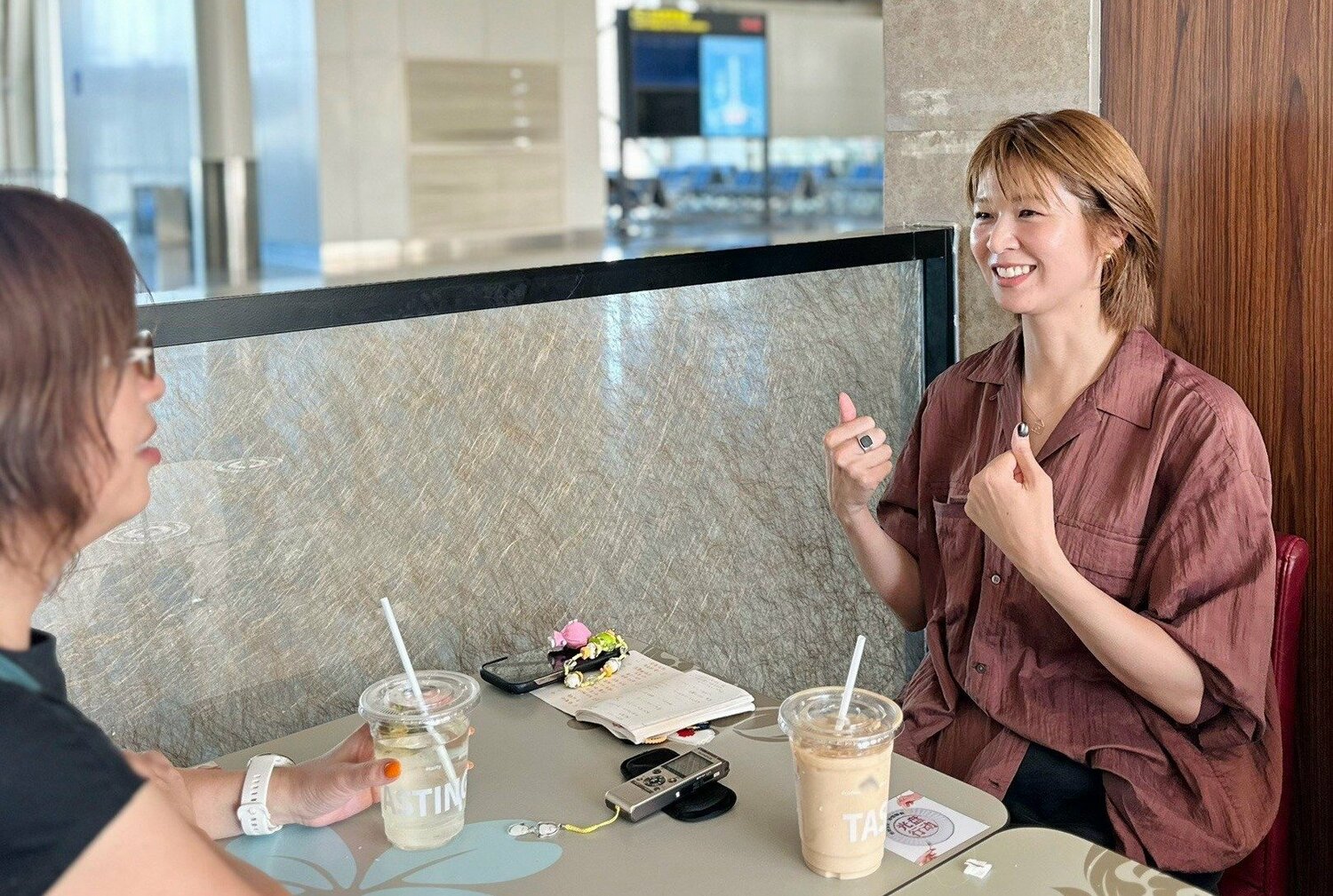 後輩たちにエールを送る木村沙織。中国からの帰国便を待つ空港で取材に応じてくれた