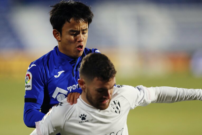 キックオフ直後、久保は守備に腐心しているように見えた