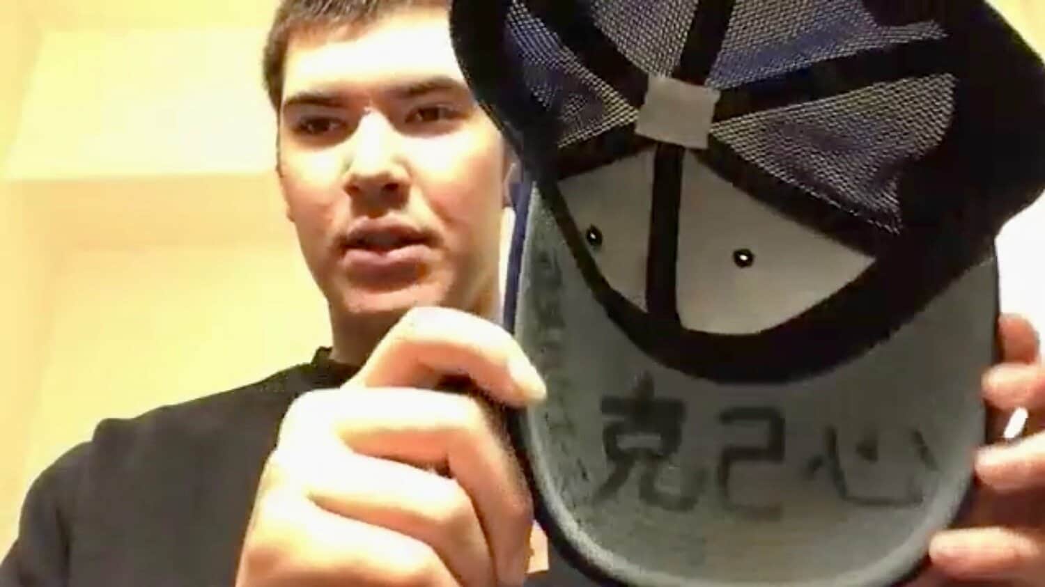 「克己心」と書かれた先輩の帽子とともに甲子園に臨む