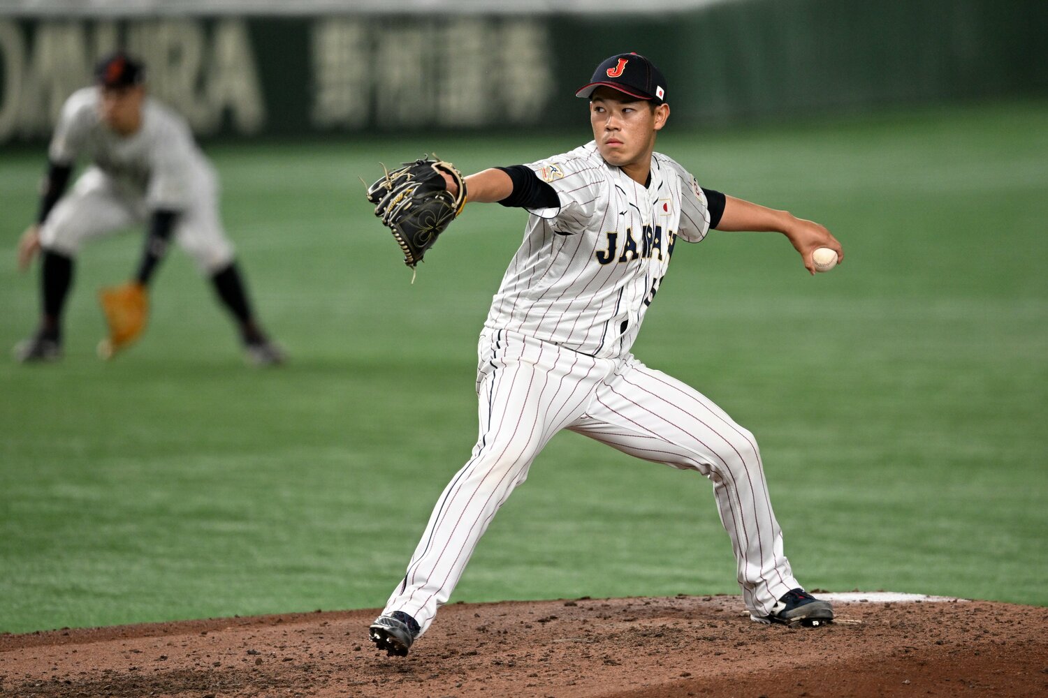 「初見ではタイミングがとりずらい」という根本のピッチング　©︎Getty Images