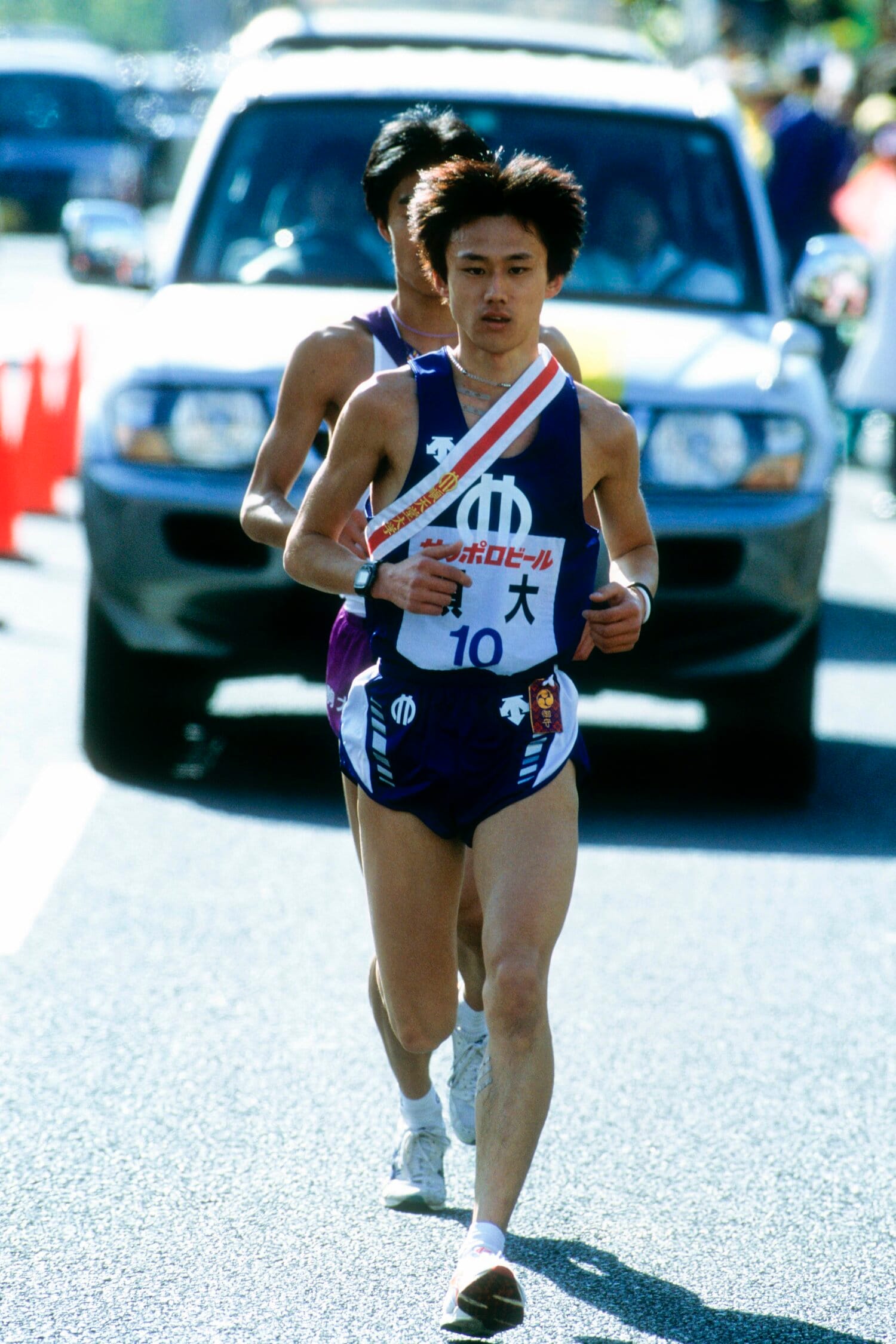 3kmで先頭の駒大・高橋桂逸に追い付くと、順大の宮崎はどこまでも冷静だった　©フォート・キシモト