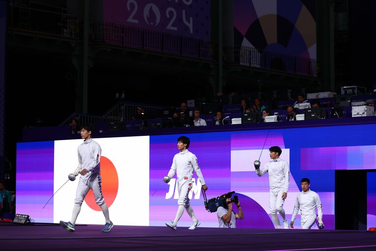 入場する日本の選手たち。先頭から古俣聖、加納虹輝、山田優、見延和靖　©Ryosuke Menju/JMPA