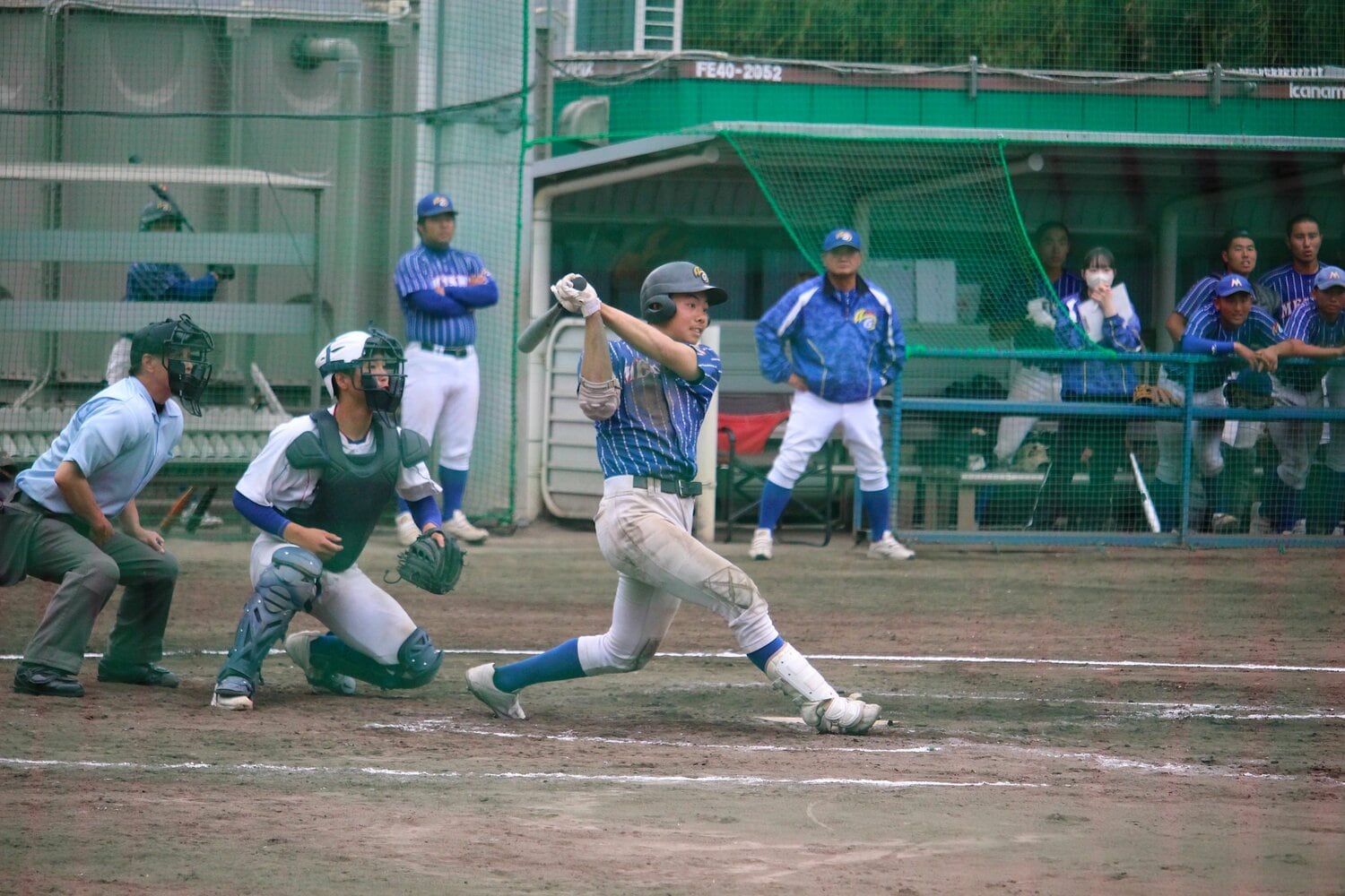 力強いスイングを見せる李 ©Yu Takagi