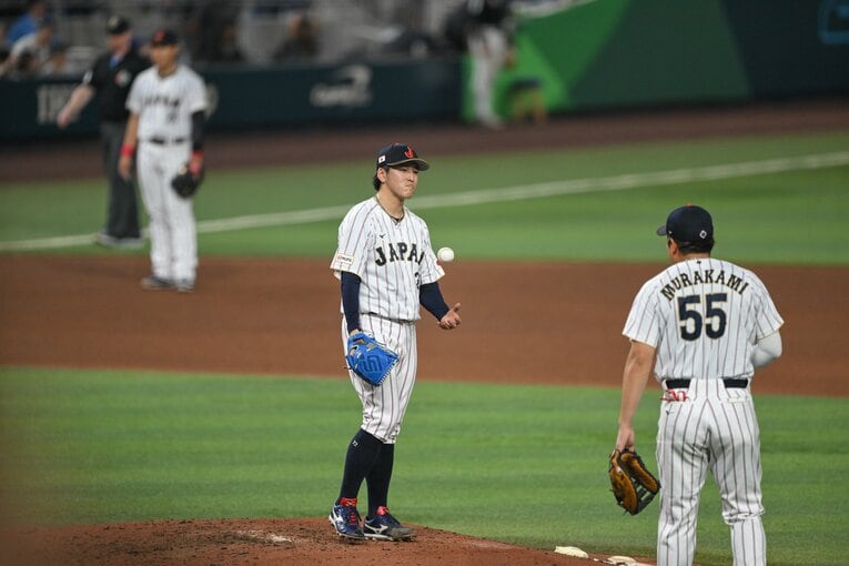 一発を浴びて悲壮な表情の隅田　©Nanae Suzuki