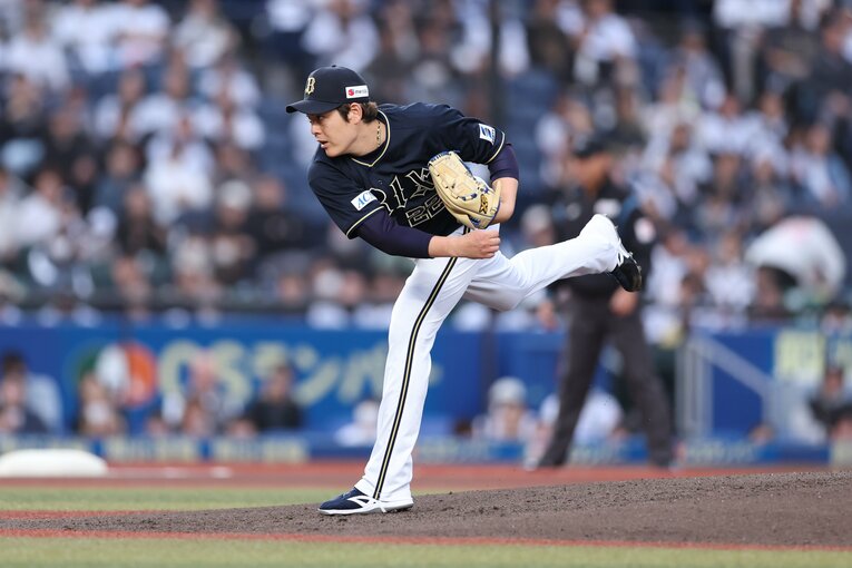 力投する九里　©JIJI PRESS