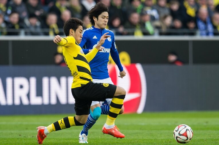 Jリーグから直接ブンデス1部の強豪（ドルトムント、シャルケ）に移籍した香川真司と内田篤人　©Getty Images