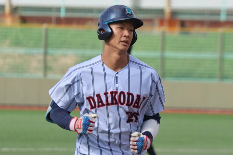 日本ハムから育成1位で指名を受けた大阪工業大の岡田光平。同大からは史上初のドラフト指名となった ／ photograph by Fumi Sawai