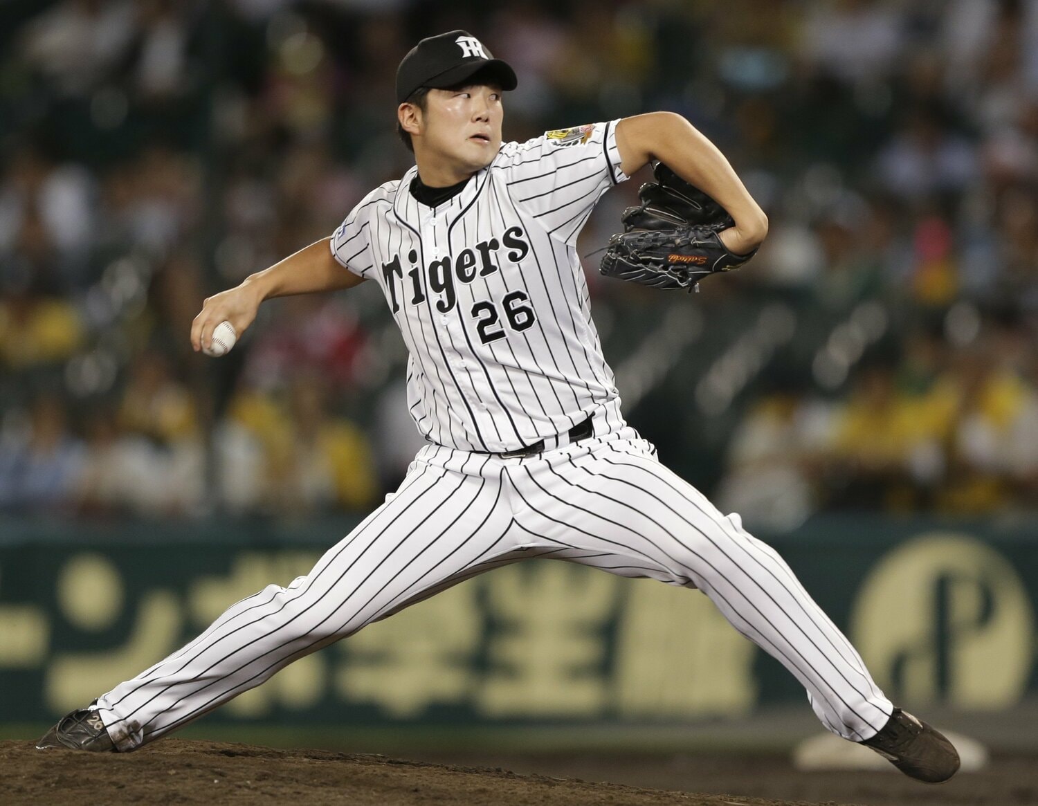 力投する歳内（2015年）　©︎JIJI PRESS