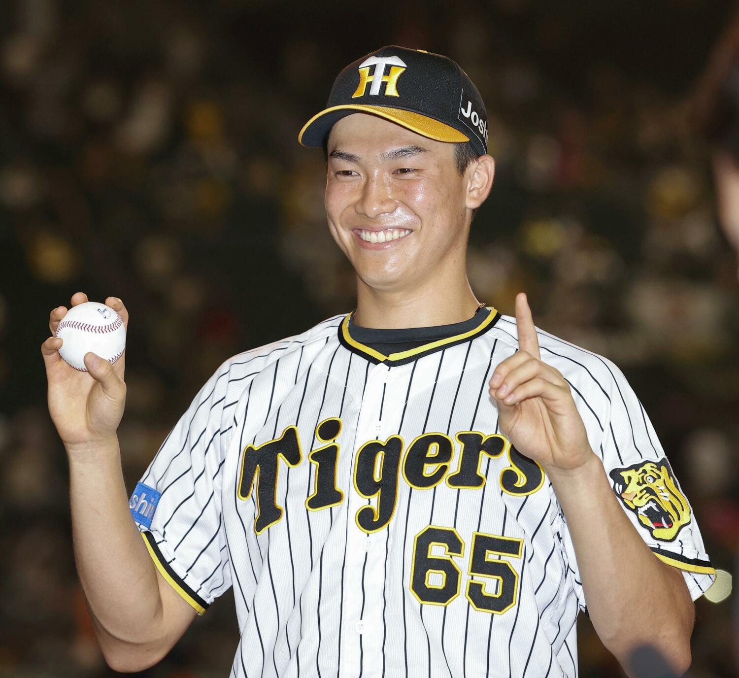 プロ初勝利を挙げるなど進境著しい湯浅　©Kyodo News