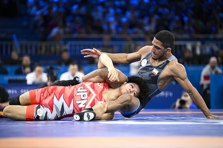 清岡幸大郎の必殺「リンクルホールド」。股間に入れた頭を支点に相手を転がしている　©Asami Enomoto/JMPA