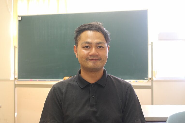 地歴公民科の教諭で、野球部監督でもある黒川健太氏 ©Uhon Cho