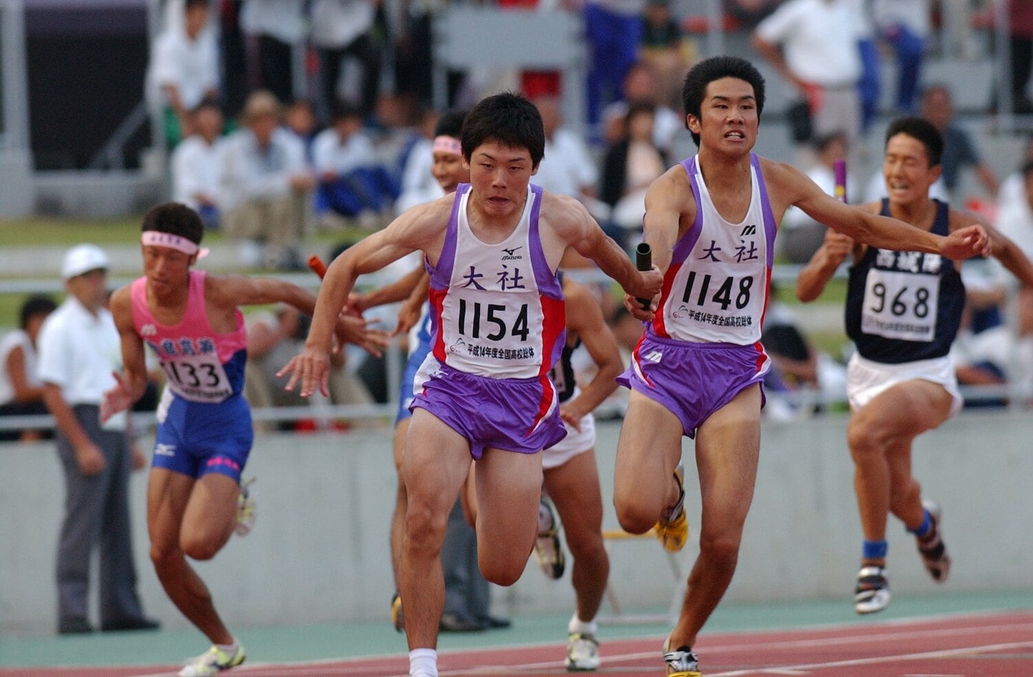 400ｍリレーでは大社初の優勝を達成。写真は3走の神門雅人→4走の原宏喜へのバトンパス　©Getsuriku