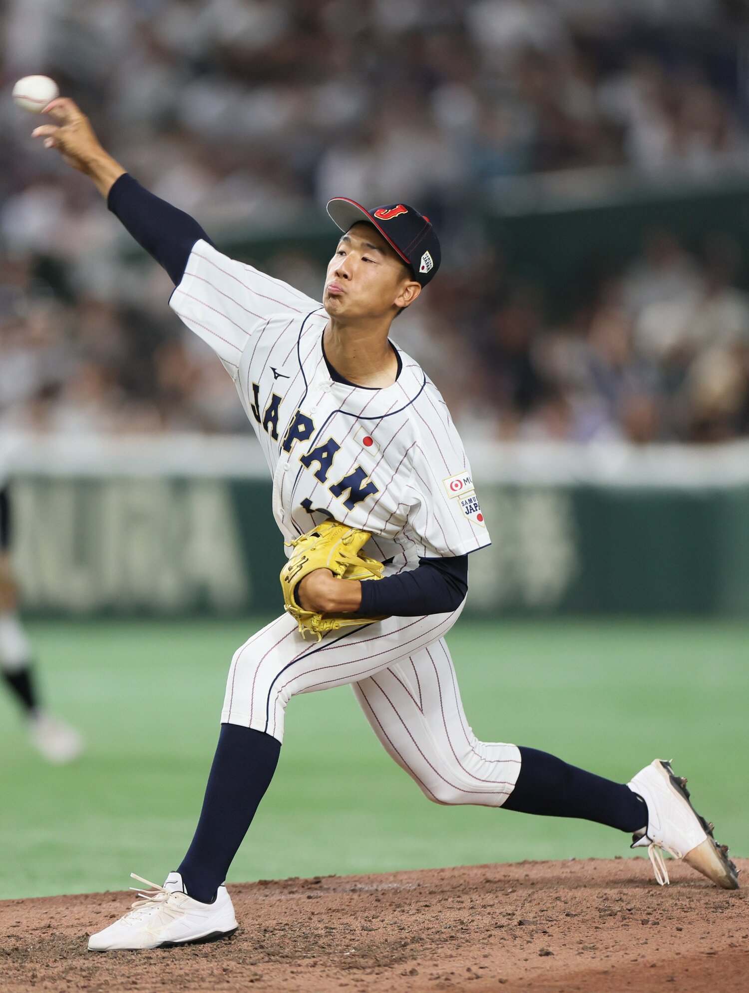 大学日本代表との試合で力投する木村　©︎JIJI PRESS