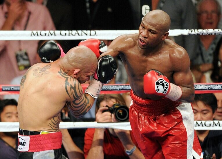 2012年5月、4階級制覇王者ミゲール・コット（プエルトリコ）に勝利　©Naoki Fukuda