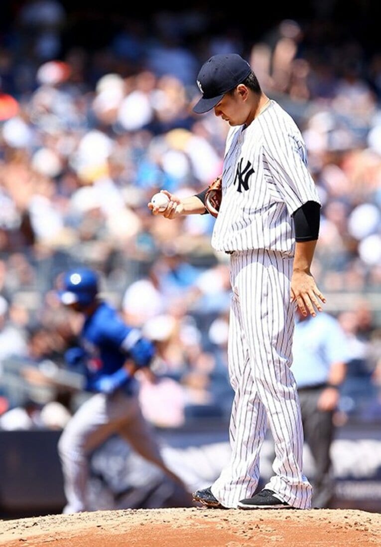 バティスタに被弾したヤンキース時代の田中将大©Getty Images