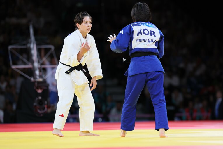 出口とホ・ミミの激闘　©Kaoru Watanabe/JMPA