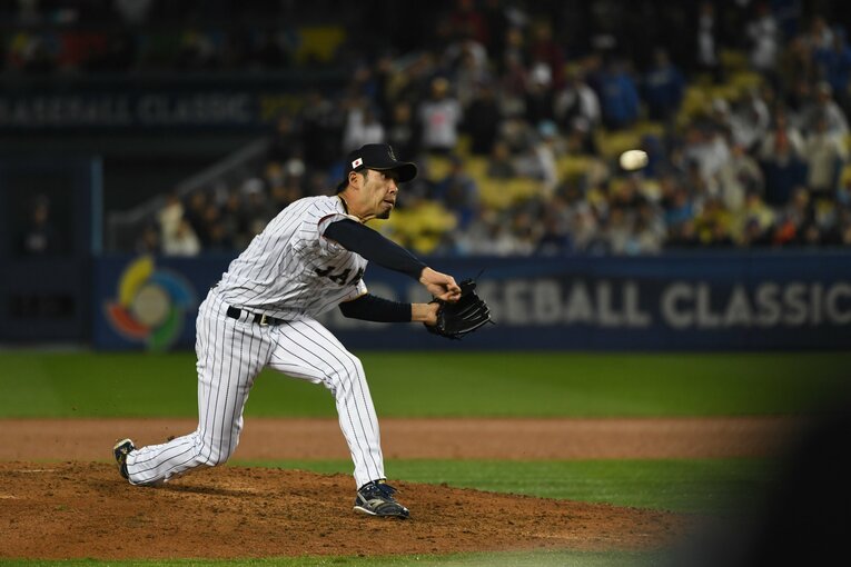 前回WBCで好リリーフを連発した秋吉　©BUNGEISHUNJU