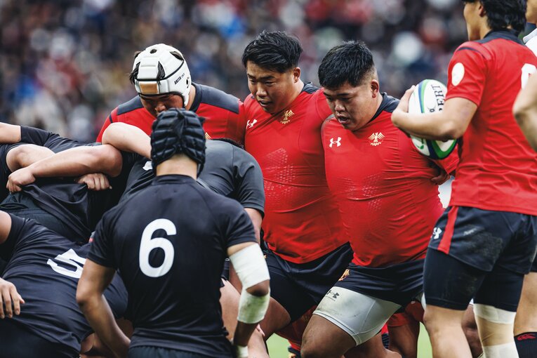 チームを率いた江良キャプテン（中央）　©︎Kiichi Matsumoto