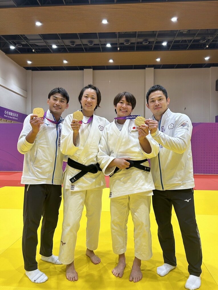 高市夫妻の恩人である台湾代表・連珍羚（左から2人目）。賢悟さんが指導する楊勇緯の姿も（写真／本人提供）