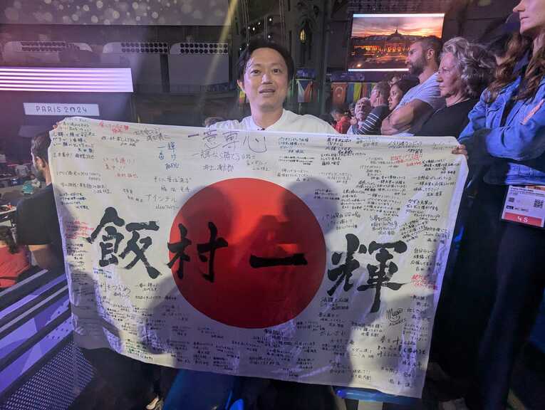 パリまで息子の応援に訪れた父の飯村栄彦さん　©Yu Saito