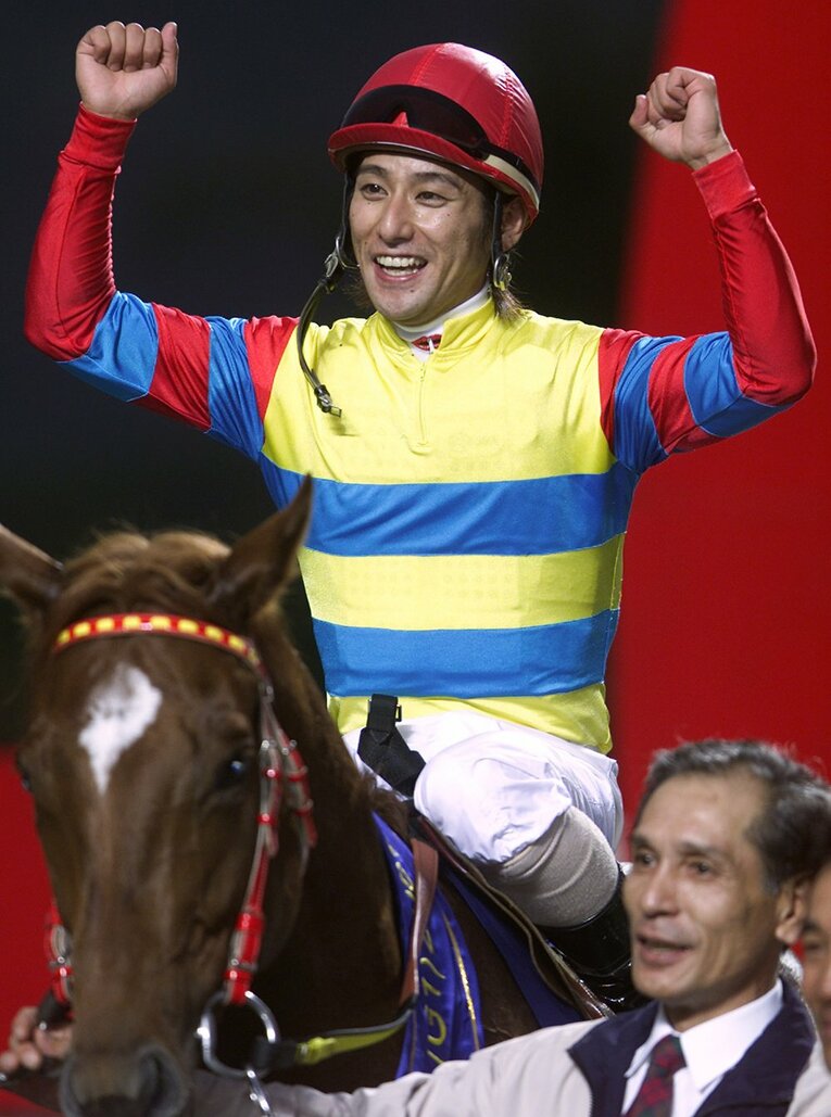 アグネスデジタルと四位洋文 ／ photograph by REUTERS/AFLO