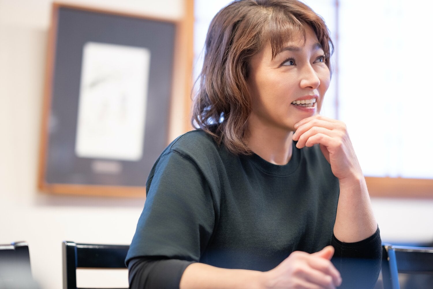 インタビューに答える小倉由美さん。現在は天ぷら割烹「天冨久」の女将