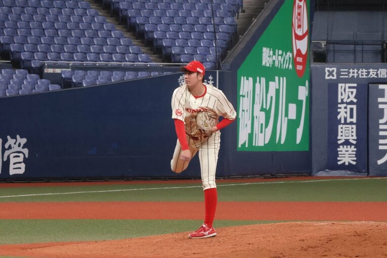 189cmの長身に加え、高校卒業後は15キロの増量に成功。球速も5キロ以上上がった　©Fumi Sawai