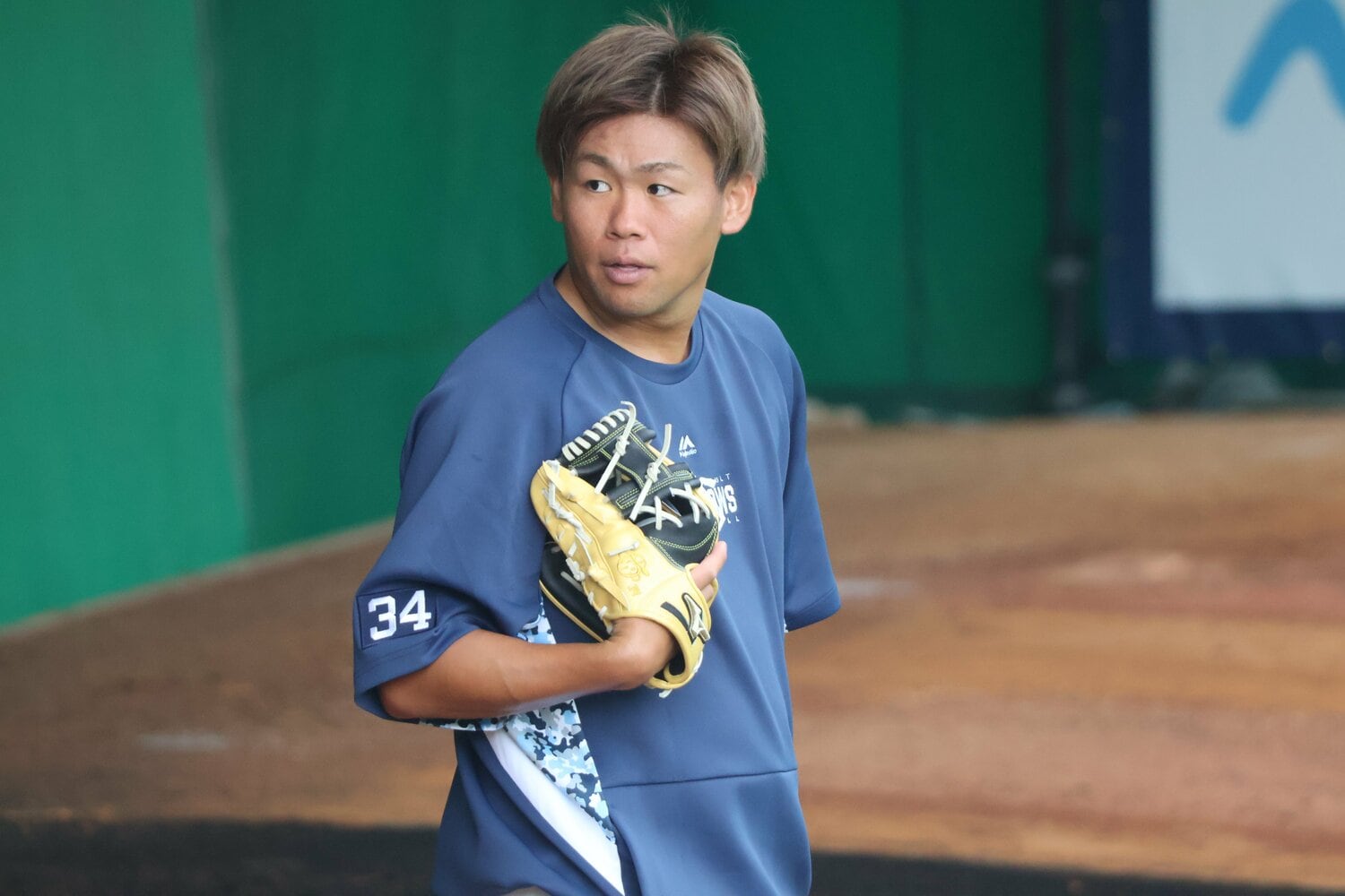 沖縄キャンプでの田口。例年とは違う取り組みを見せていたが、故障で途中離脱となった　©Fumi Sawai