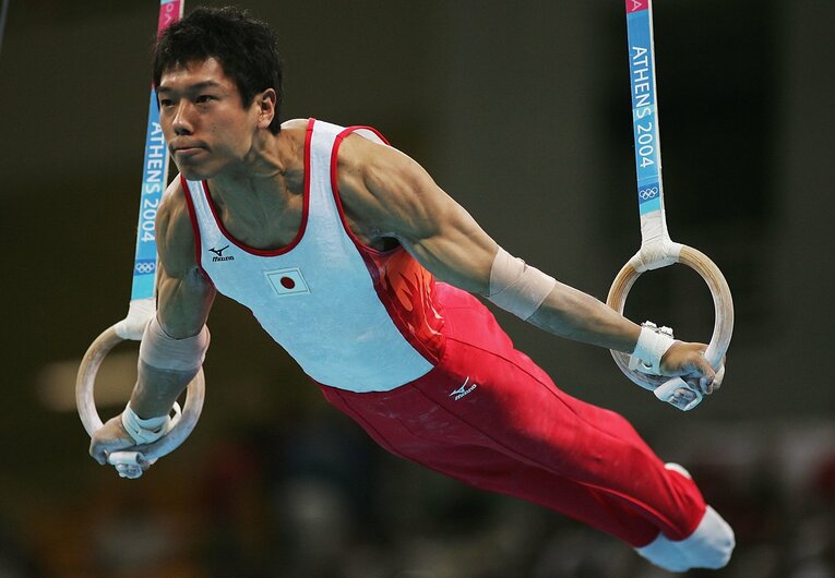 アテネ2004体操男子団体決勝にはつり輪で出場　©Getty Images　©IOC-All Rights Reserved.