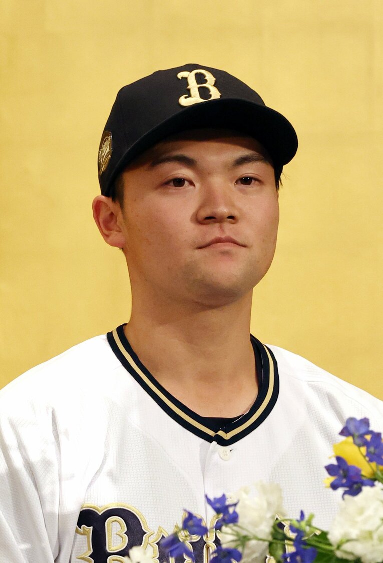 捕手指名されたオリックス4位の山中。大学時代の後半以降は内外野をメインに守っていたが…　©JIJI PRESS