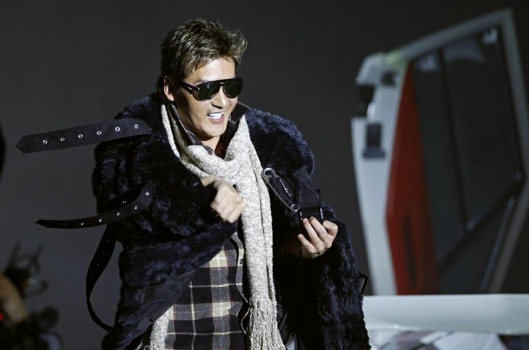 11月30日のファンフェスティバルにて、新庄剛志は純白のランボルギーニ・カウンタックで札幌ドームに登場。サッカー界ではなかなか想像できない光景だ ／ photograph by JIJI PRESS