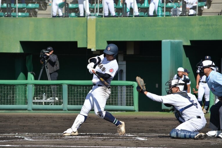 末吉のバッティング　©Takarin Matsunaga