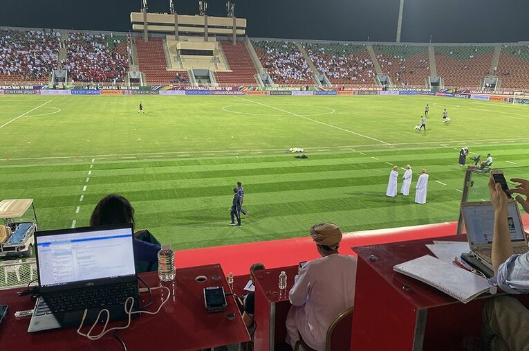 オマーン戦の記者席から。試合取材に至るまで様々な驚きの出来事があったという ／ photograph by Atsushi Iio