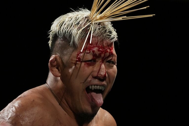 頭に竹串を刺され、血まみれになりながら笑みを浮かべる竹田誠志
